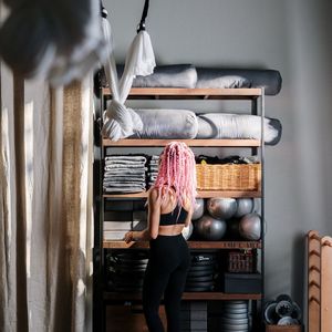 Sofia Kravchuk smiling professional yoga instructor with a serene background